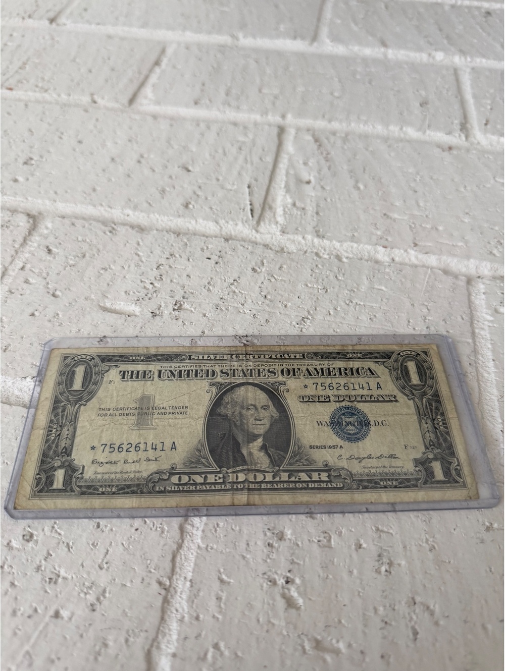 Vintage United States One Dollar Bill Featuring George Washington in Protective